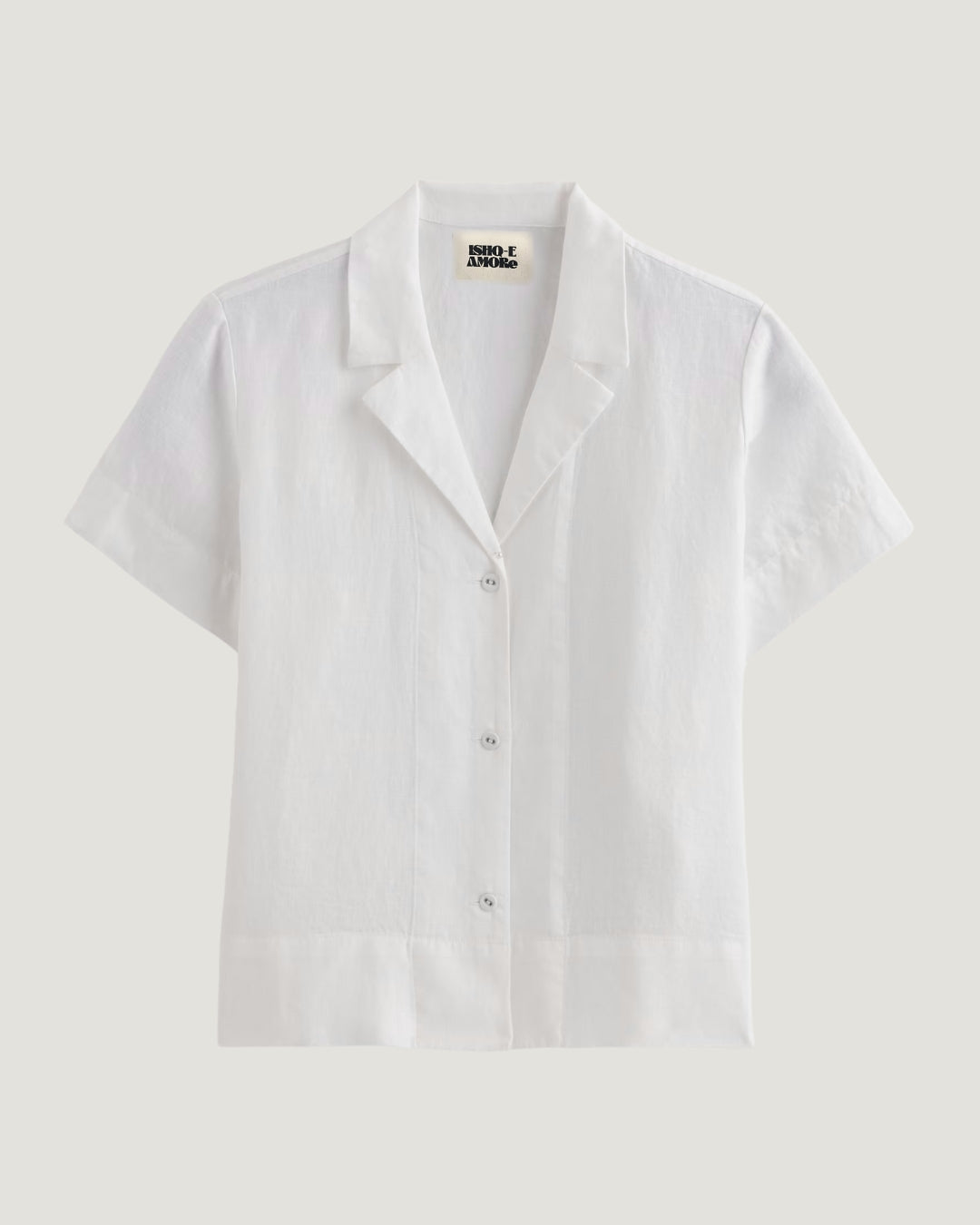 White short-sleeve shirt on a light gray background