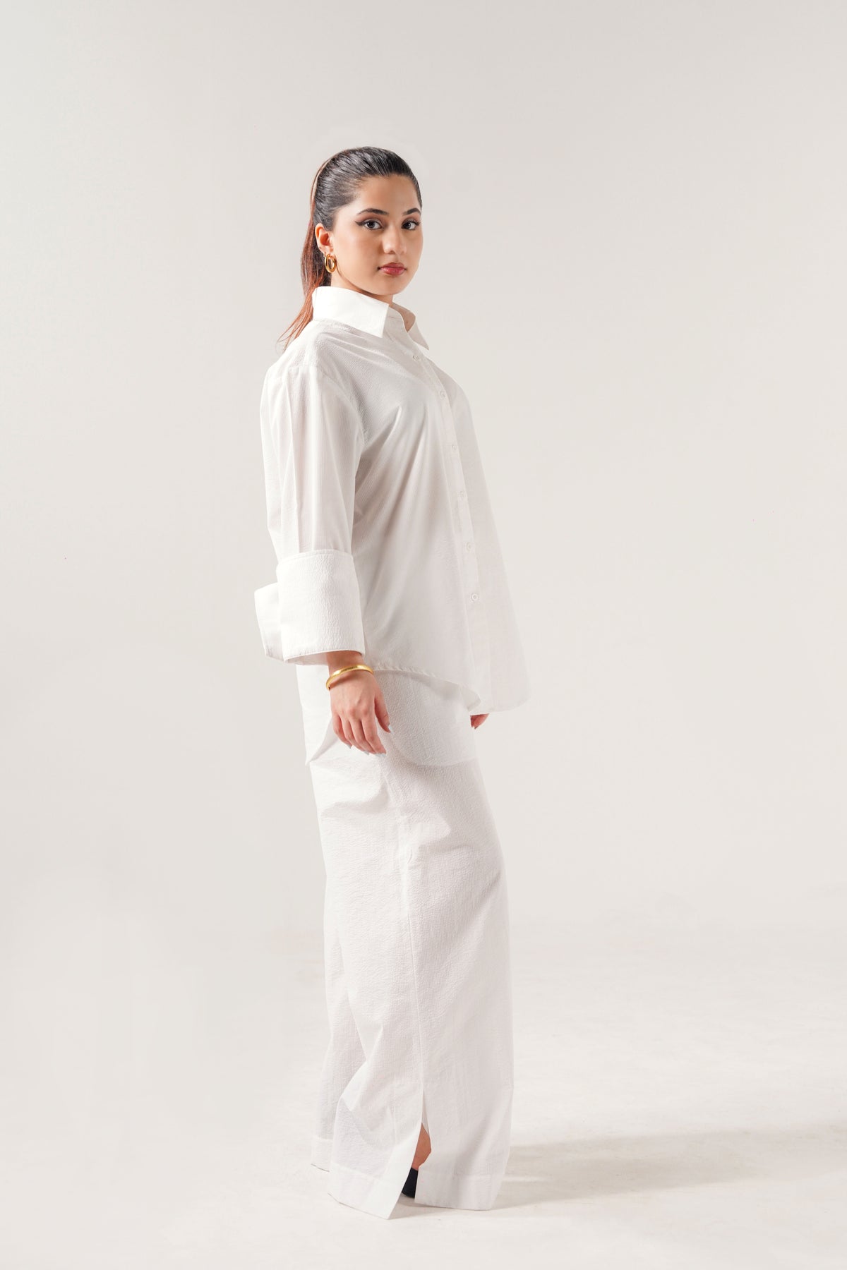 girl wearing a white outfit on a white background in seersucker ishq e amore 