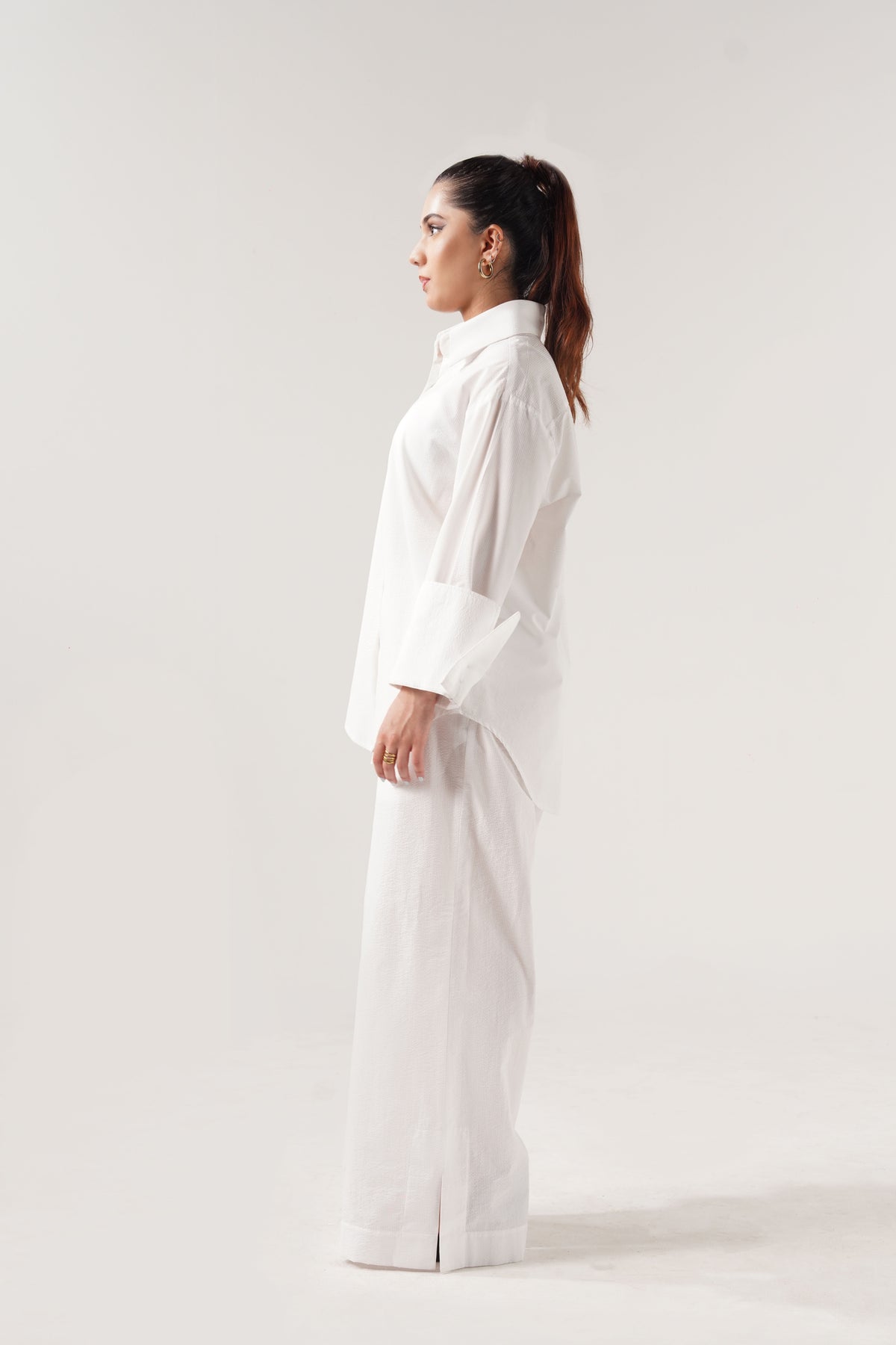 girl wearing a white outfit on a white background in seersucker ishq e amore 