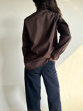 The “Boardroom Breeze” top in Chocolate Brown