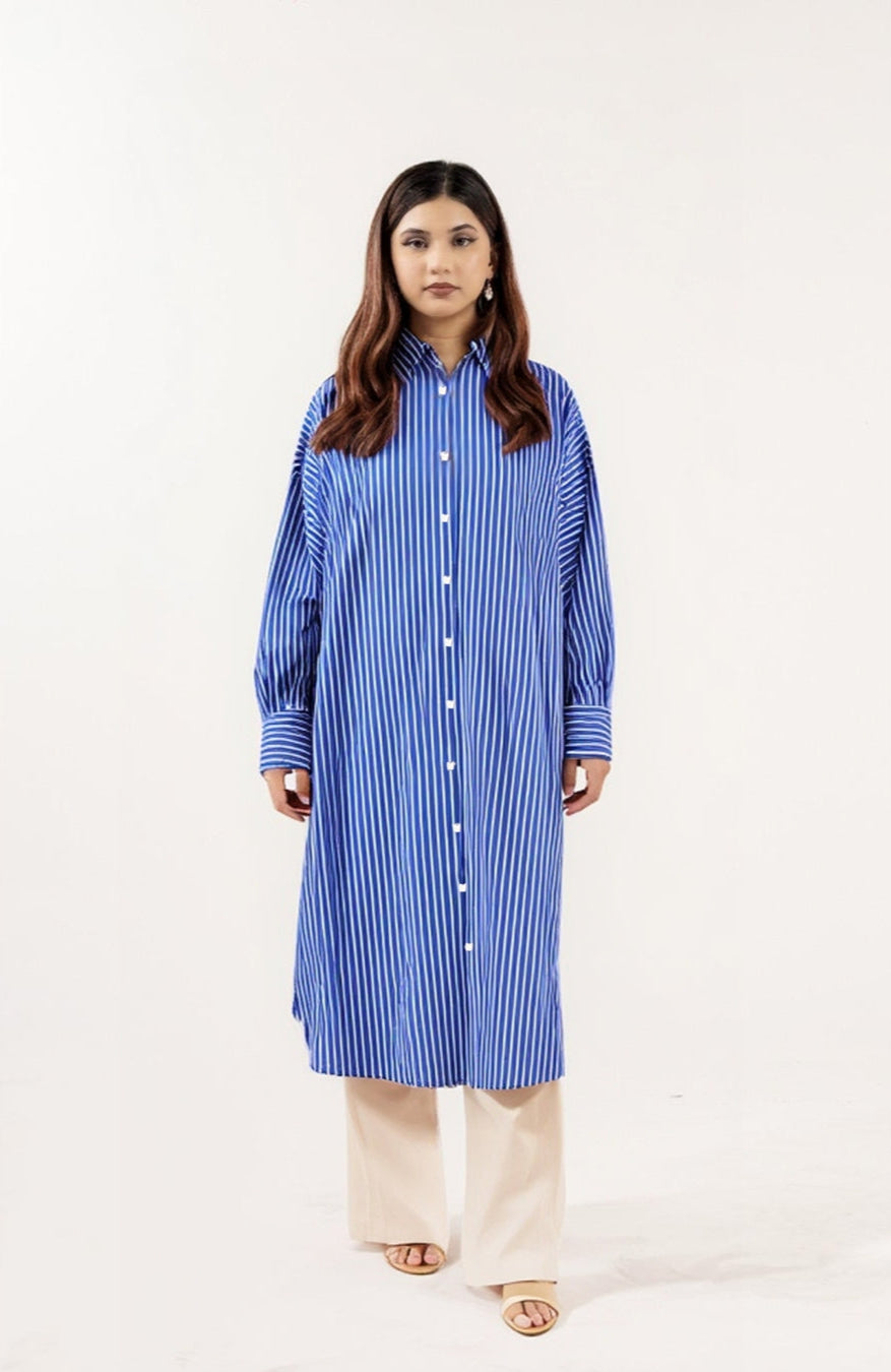 girl wearing a blue pinstripe shirt dress in cotton 