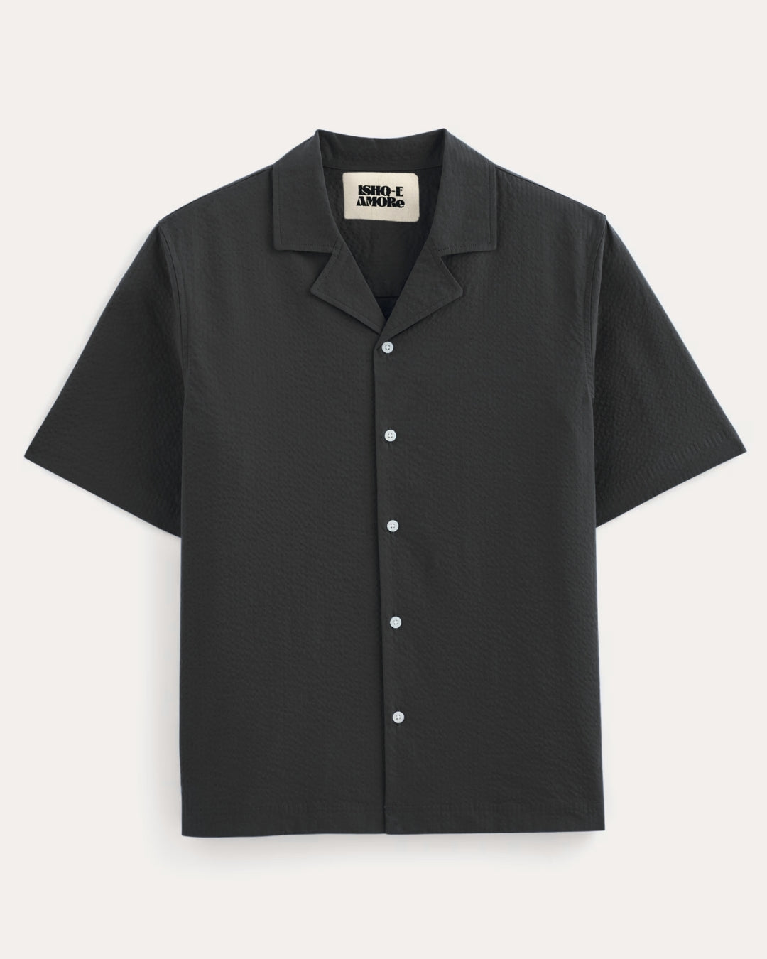 Black short-sleeve shirt with collar on a light gray background