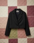 Black pinstripe cropped blazer. ishq e amore. tailored sustainable clothing celebrity 